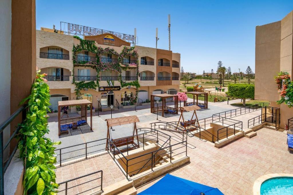 Marina Eye Resort - Alamien Marina Plaza Ел Аламейн Екстериор снимка